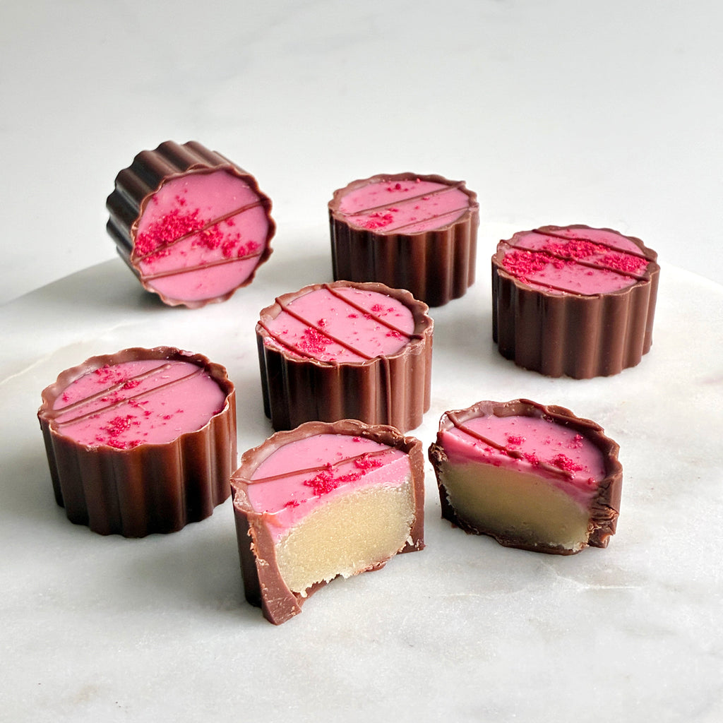 påskekonfekt påskemarsipan påskesjokolade gave gavetips spiselig gave påskegave firmagave appelsinsjokolade appelsinkonfekt bringebær sitron