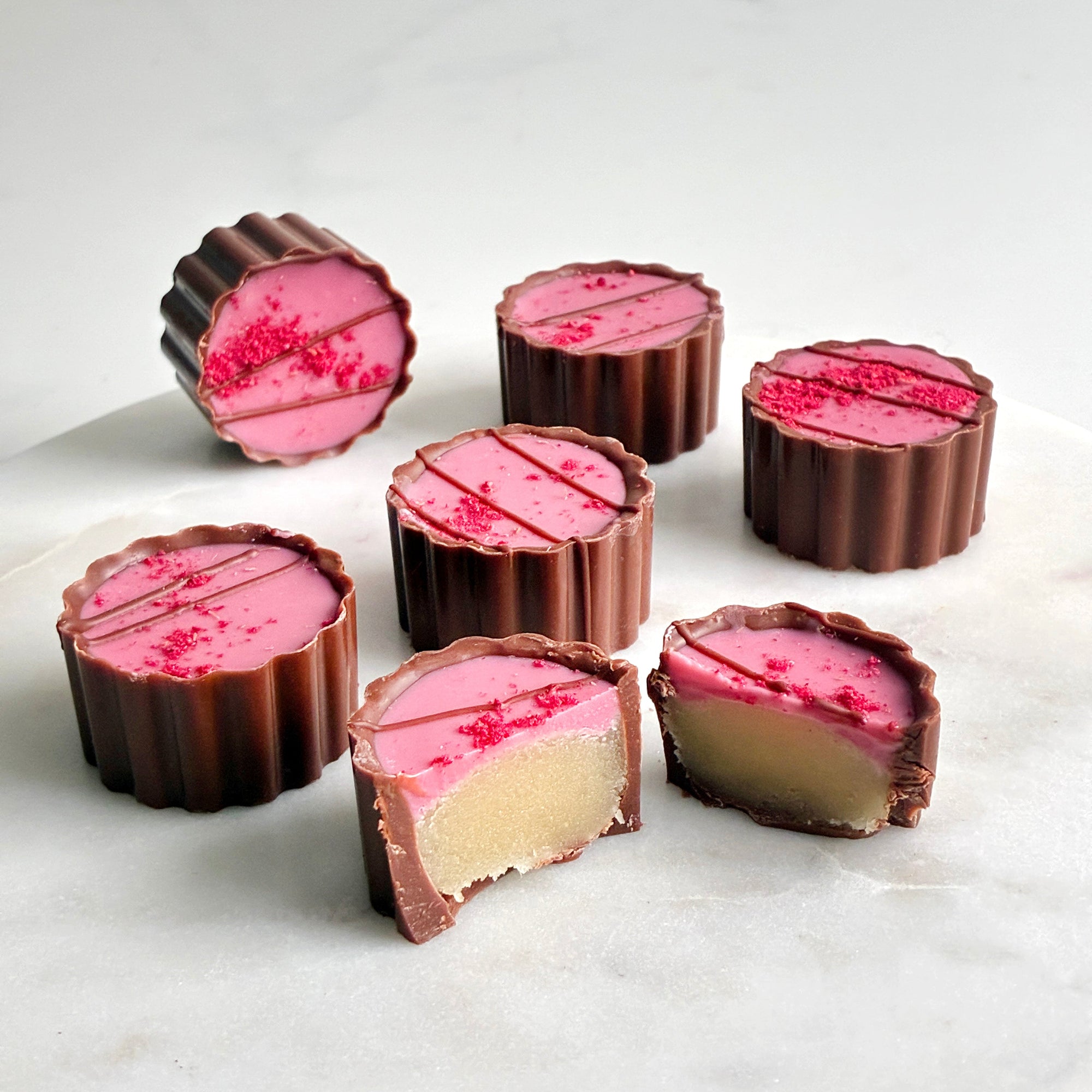 påskekonfekt påskemarsipan påskesjokolade gave gavetips spiselig gave påskegave firmagave appelsinsjokolade appelsinkonfekt bringebær sitron