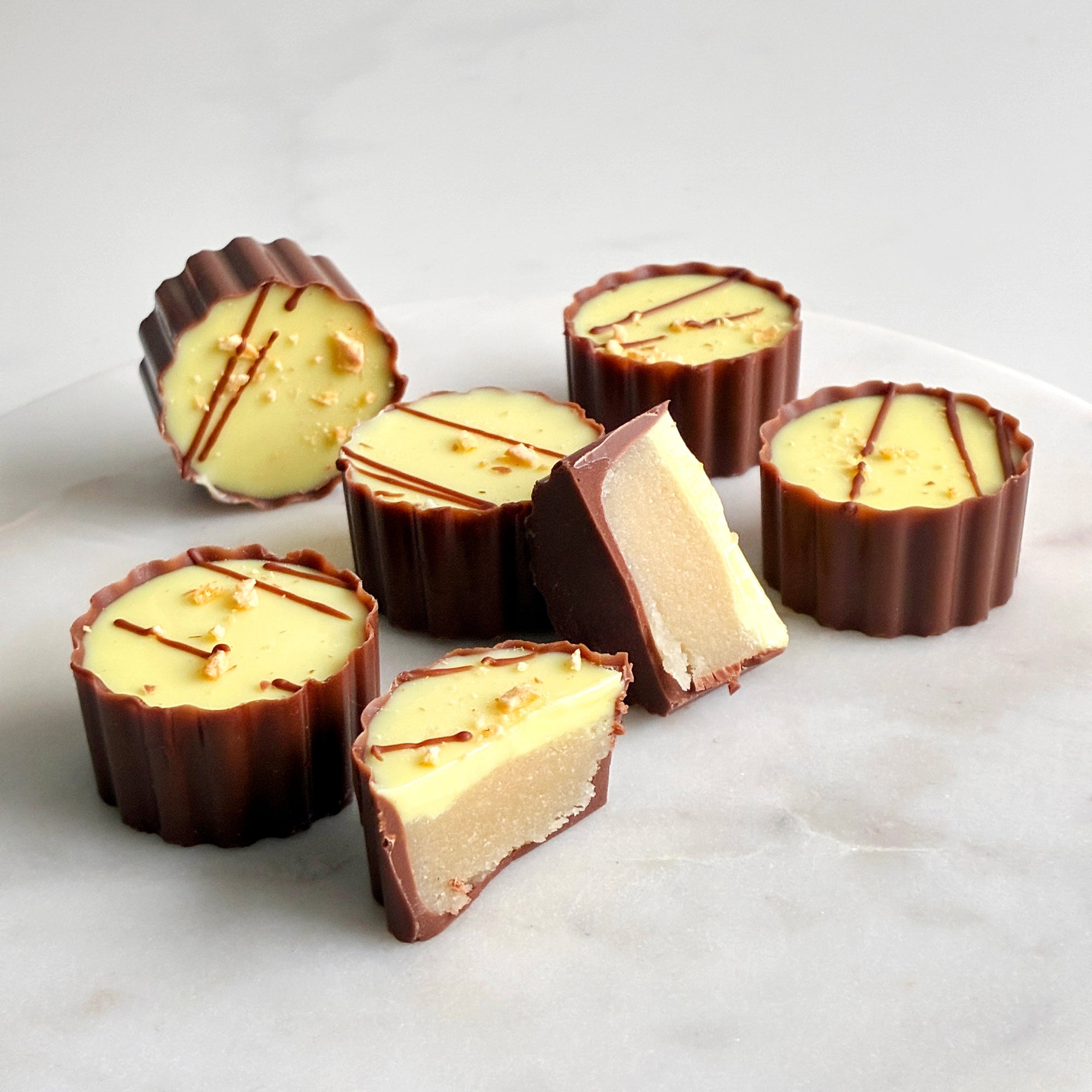 påskekonfekt påskemarsipan påskesjokolade gave gavetips spiselig gave påskegave firmagave appelsinsjokolade appelsinkonfekt bringebær sitron