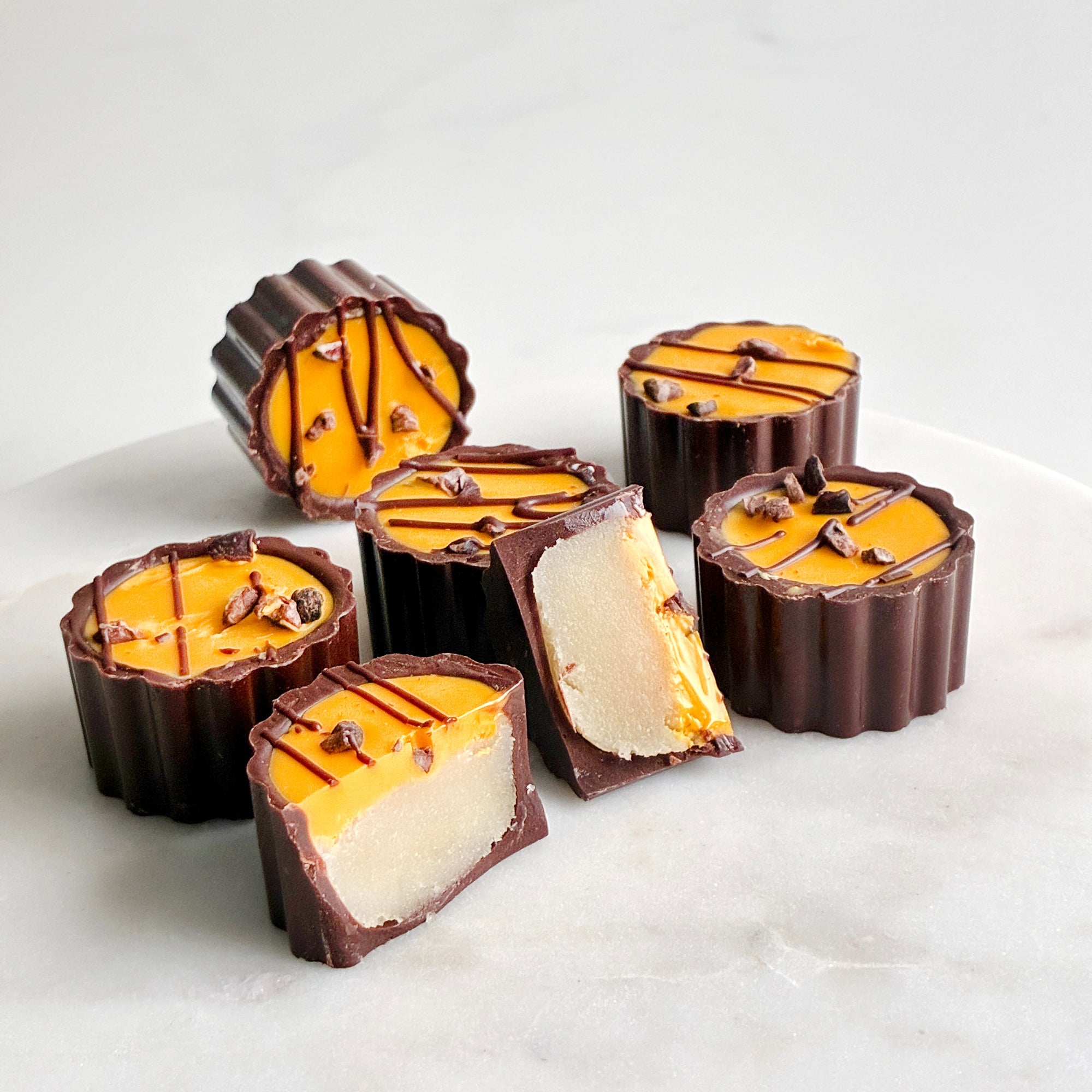 påskekonfekt påskemarsipan påskesjokolade gave gavetips spiselig gave påskegave firmagave appelsinsjokolade appelsinkonfekt bringebær sitron